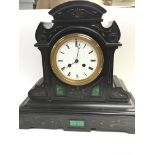 A Victorian black slate and green malachite mantel