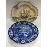 A 19th Century blue and white plate and an HMS Vic