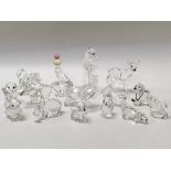 A collection of Swarovski animals, all with boxes,
