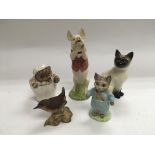 Five Beswick figures of animals.