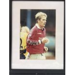 A signed and framed photo of David Beckham, approx