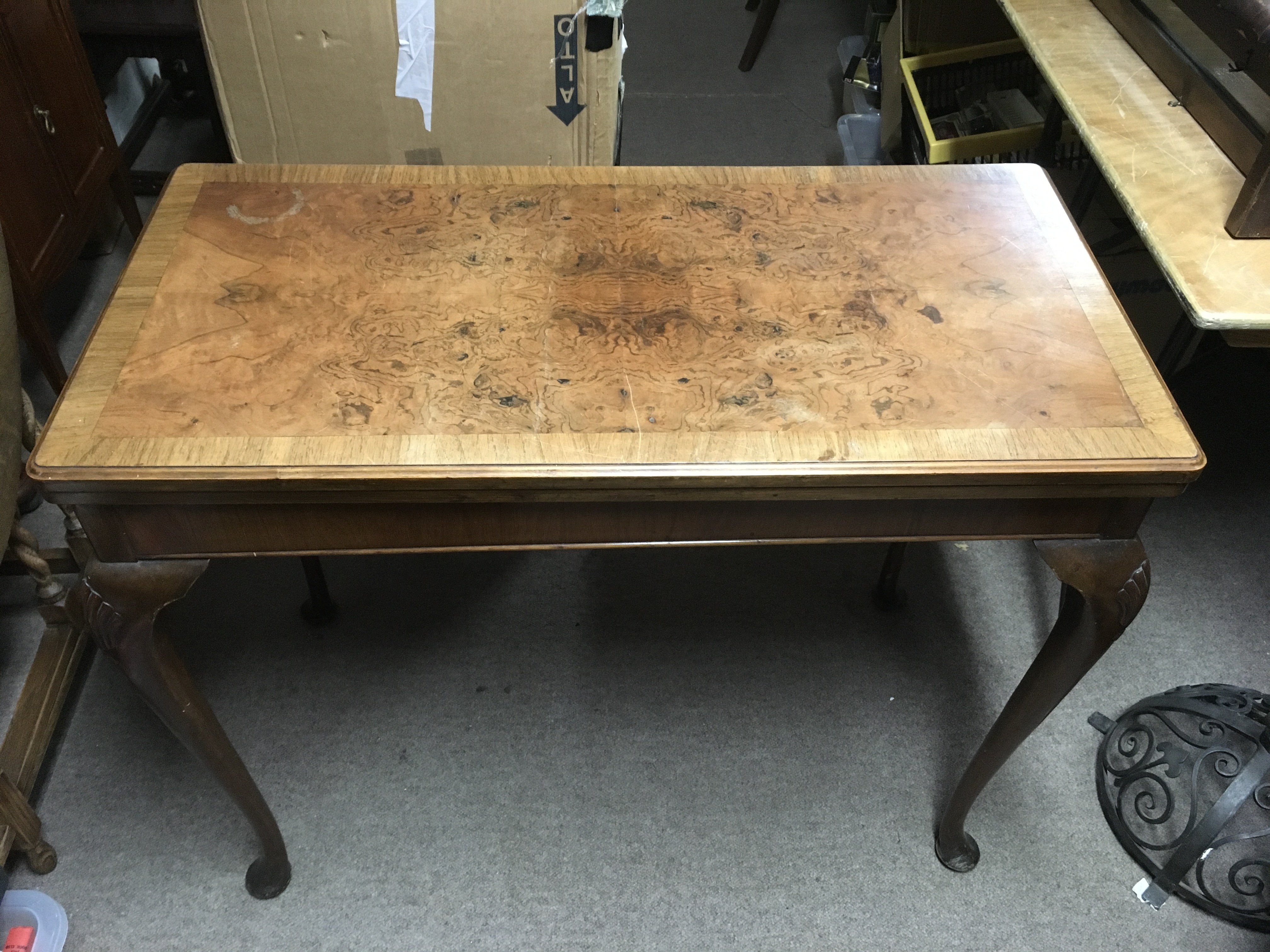 A walnut, folding card table.Approx 91x91cm extendedx74cm high