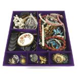 A box of various costume jewellery