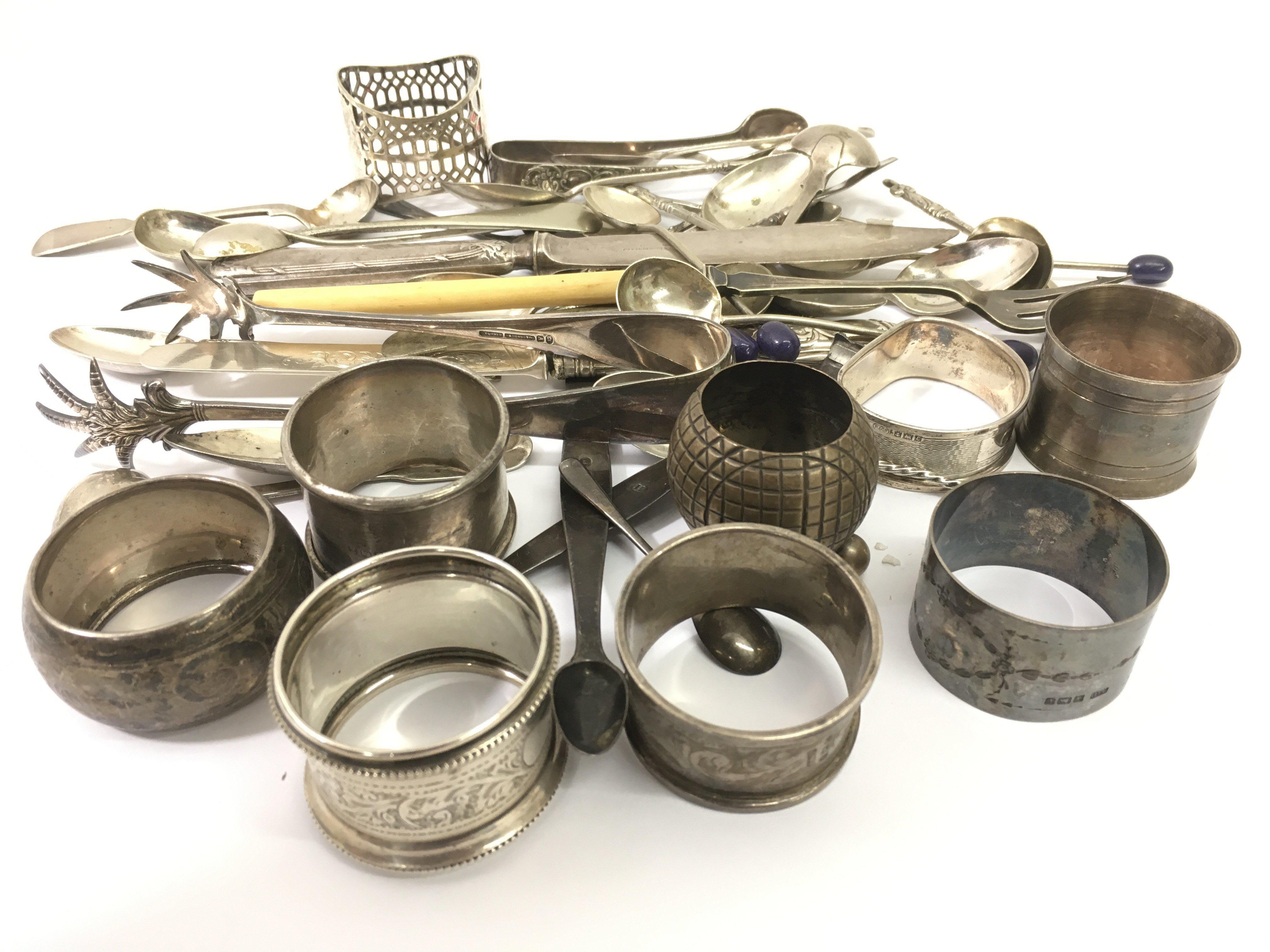 A bag of silver and plated odds. Silver weight app