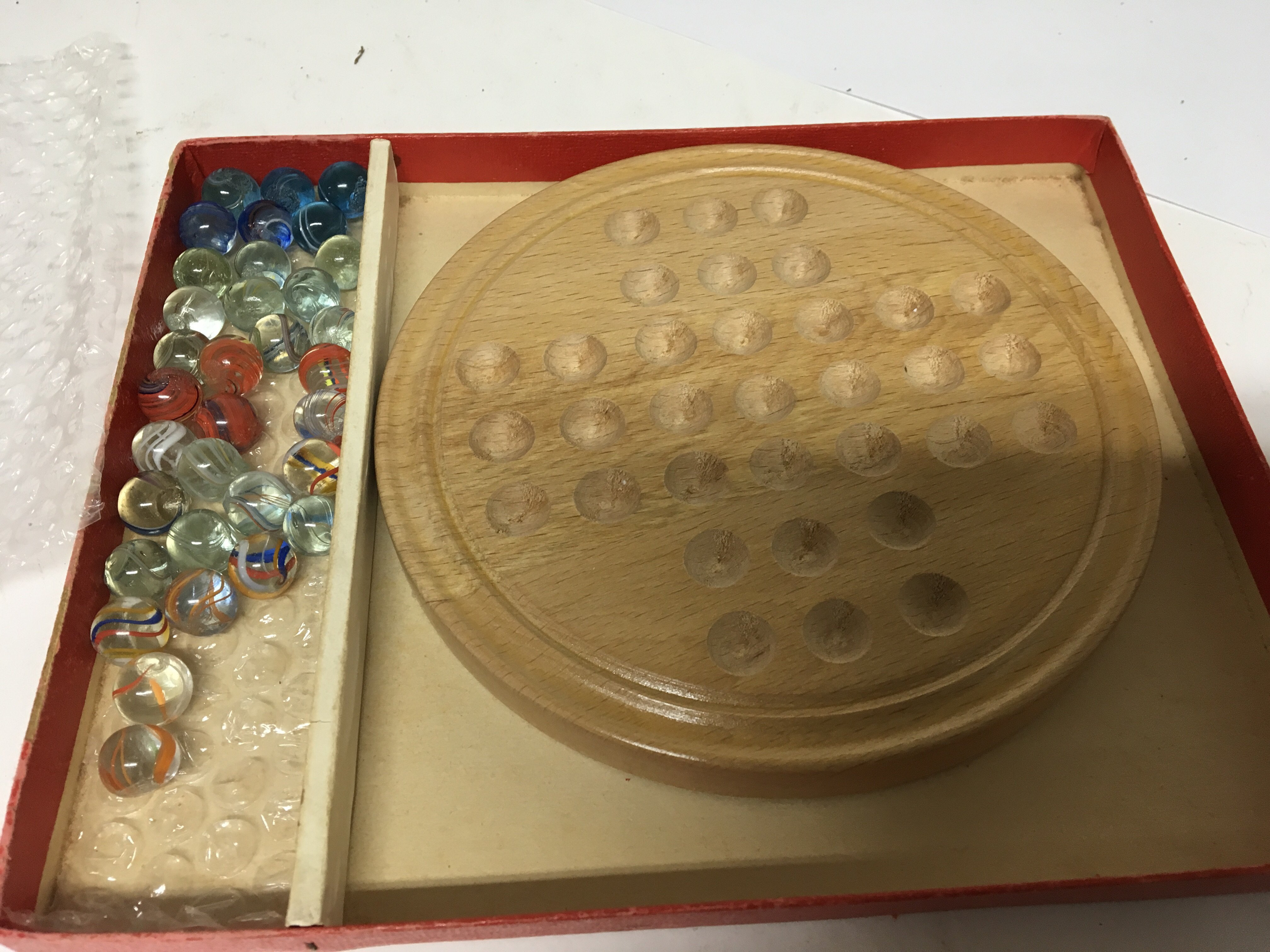 A rare boxed Percys Solitaire in a fitted box with rare smaller handmade marbles 1/2 inch attributed - Image 2 of 3