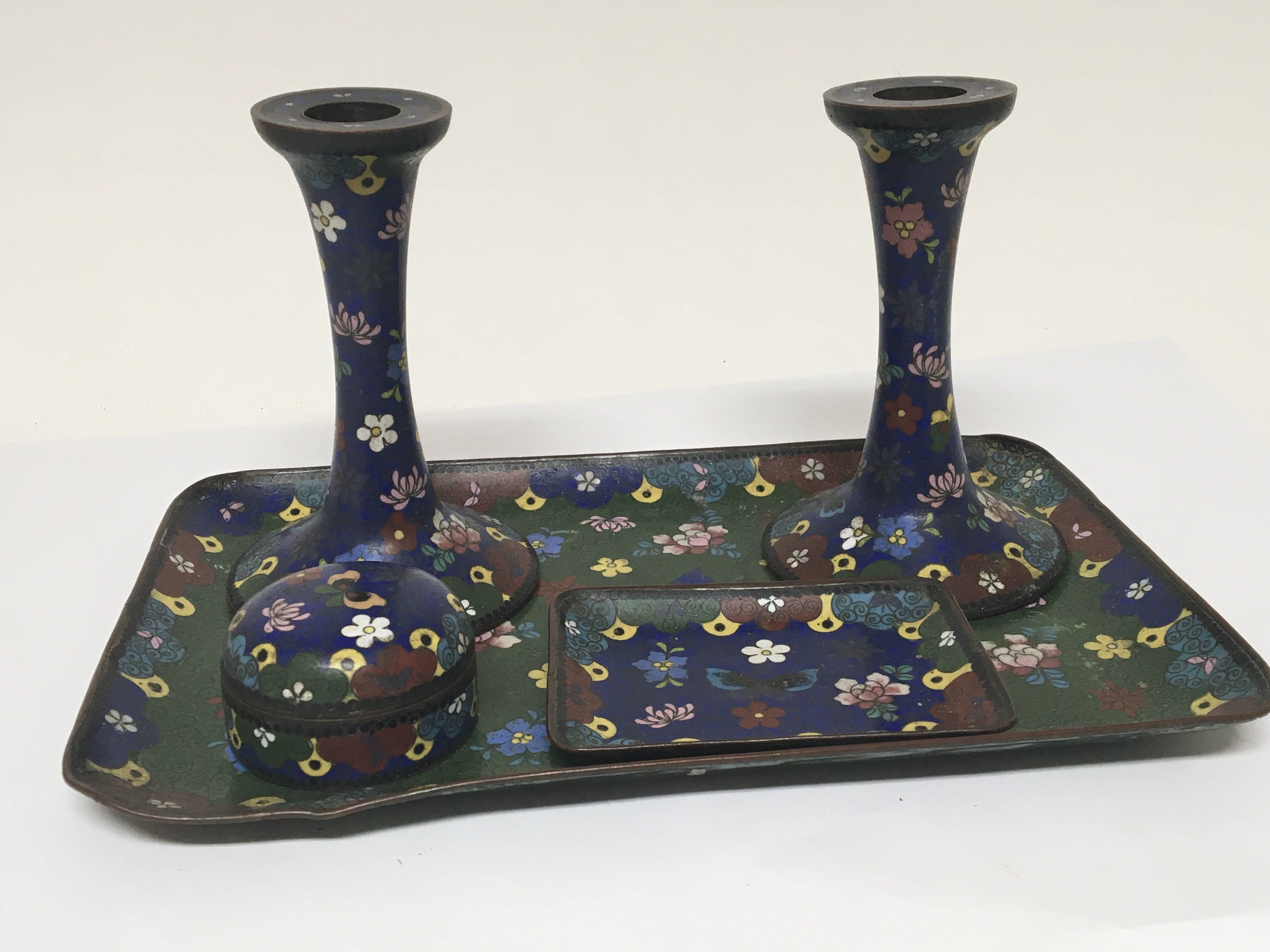 A cloisonné dressing table tray with candle sticks