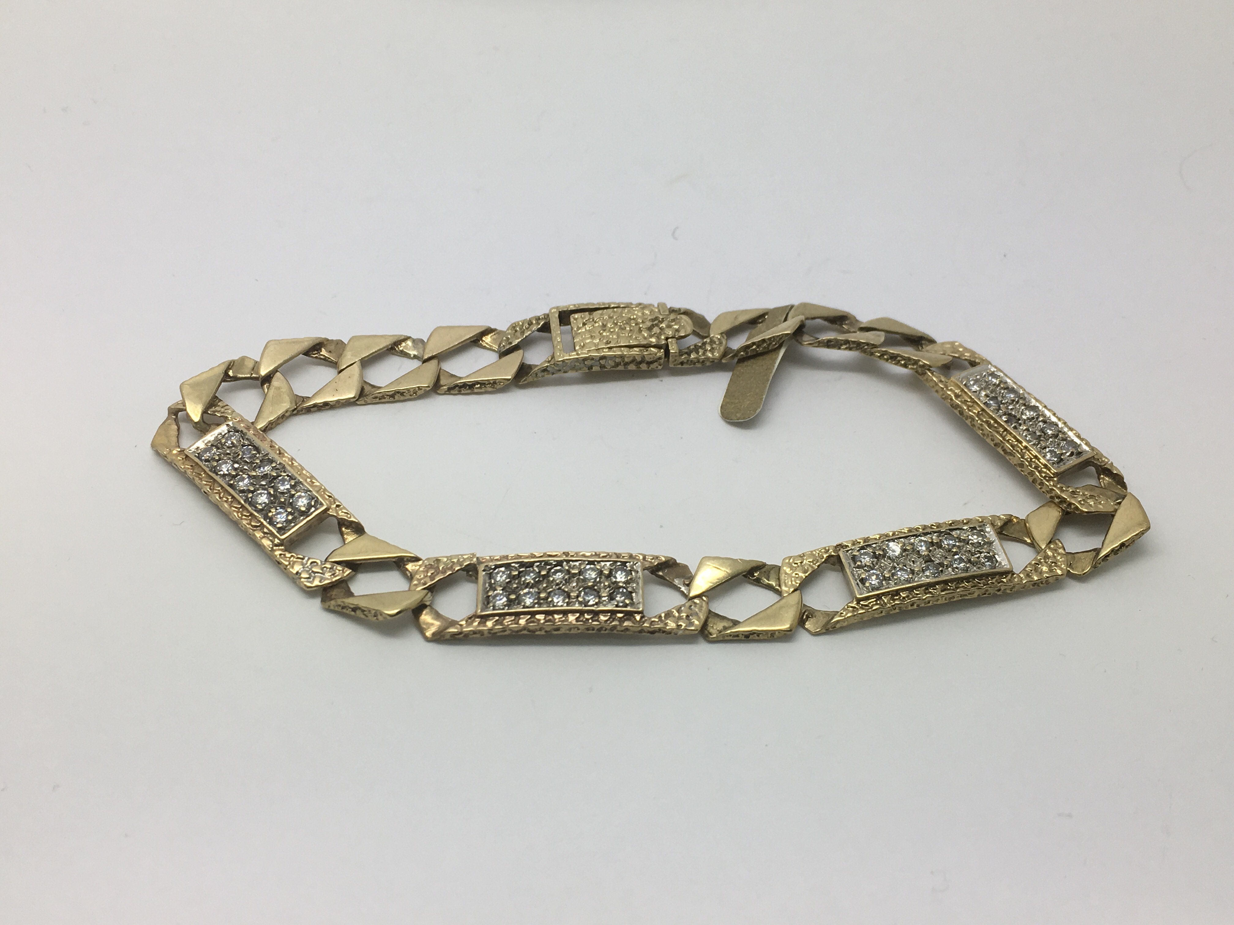 A 9ct gold stone set bracelet, approx 17g.