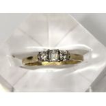 An 18ct gold, three stone diamond ring, .35ct.Appr