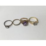A collection of four rings including 18 ct , two 9