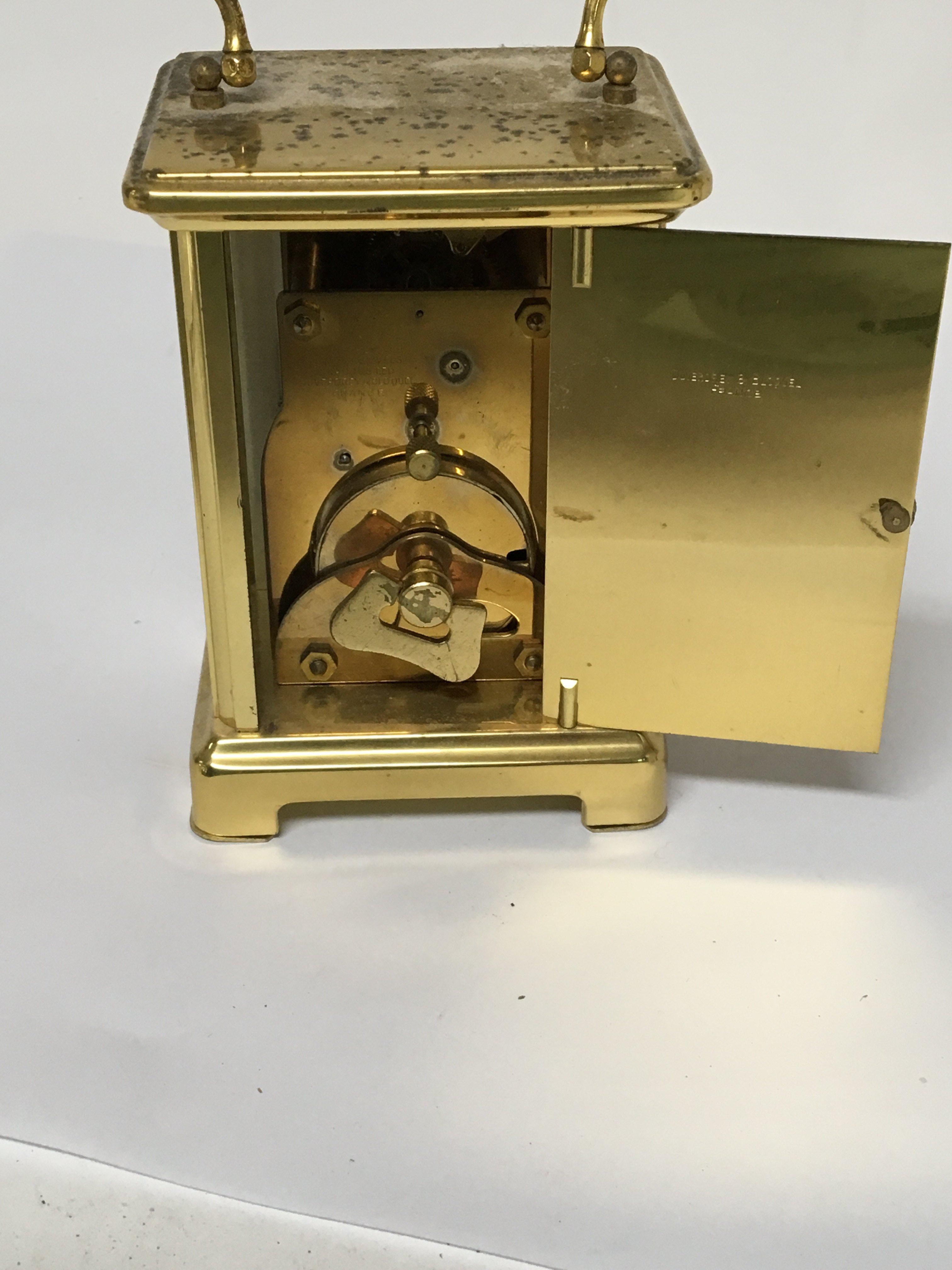 A brass cased French carriage clock the dial and back plate with retailer and makers Duverdrey & - Image 2 of 2