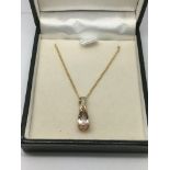A 9ct gold, morganite and diamond pendant, approx