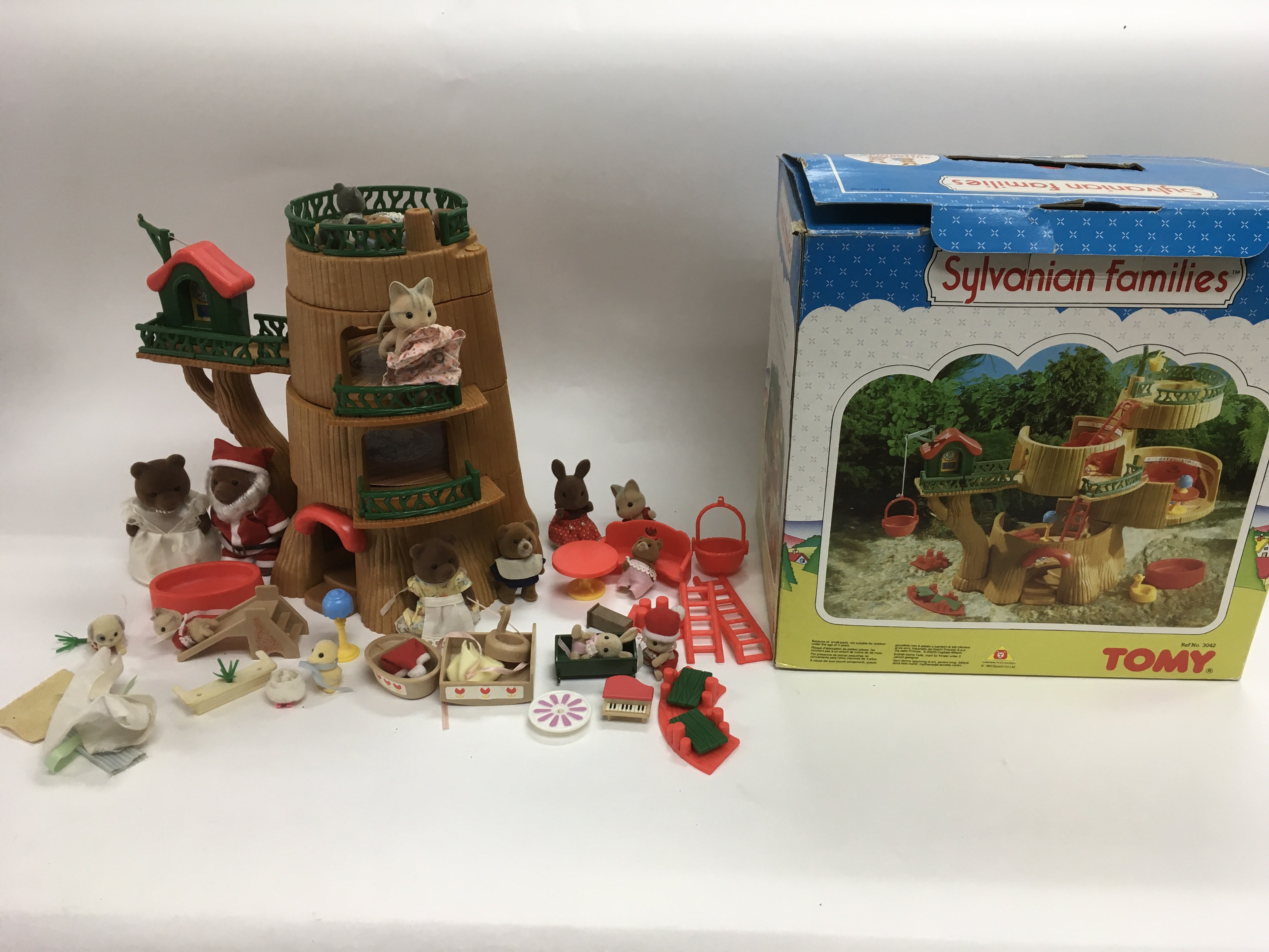 Four boxed Sylvanian Families toys and accessories