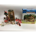 Four boxed Sylvanian Families toys and accessories