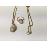 A opal pendant with attached 9 ct gold chain and a