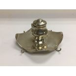 An Edwardian silver ink stand complete with clear