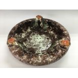 A German art pottery charger, approx diameter 35cm