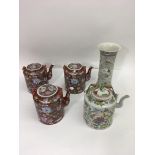 Four Chinese floral decorated teapots and a vase,