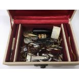 A box of various oddments including a button hook,