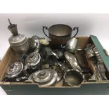 A box of silver plated items.