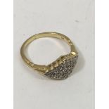 An 18ct gold ring set with 1/2 carat of diamonds.A
