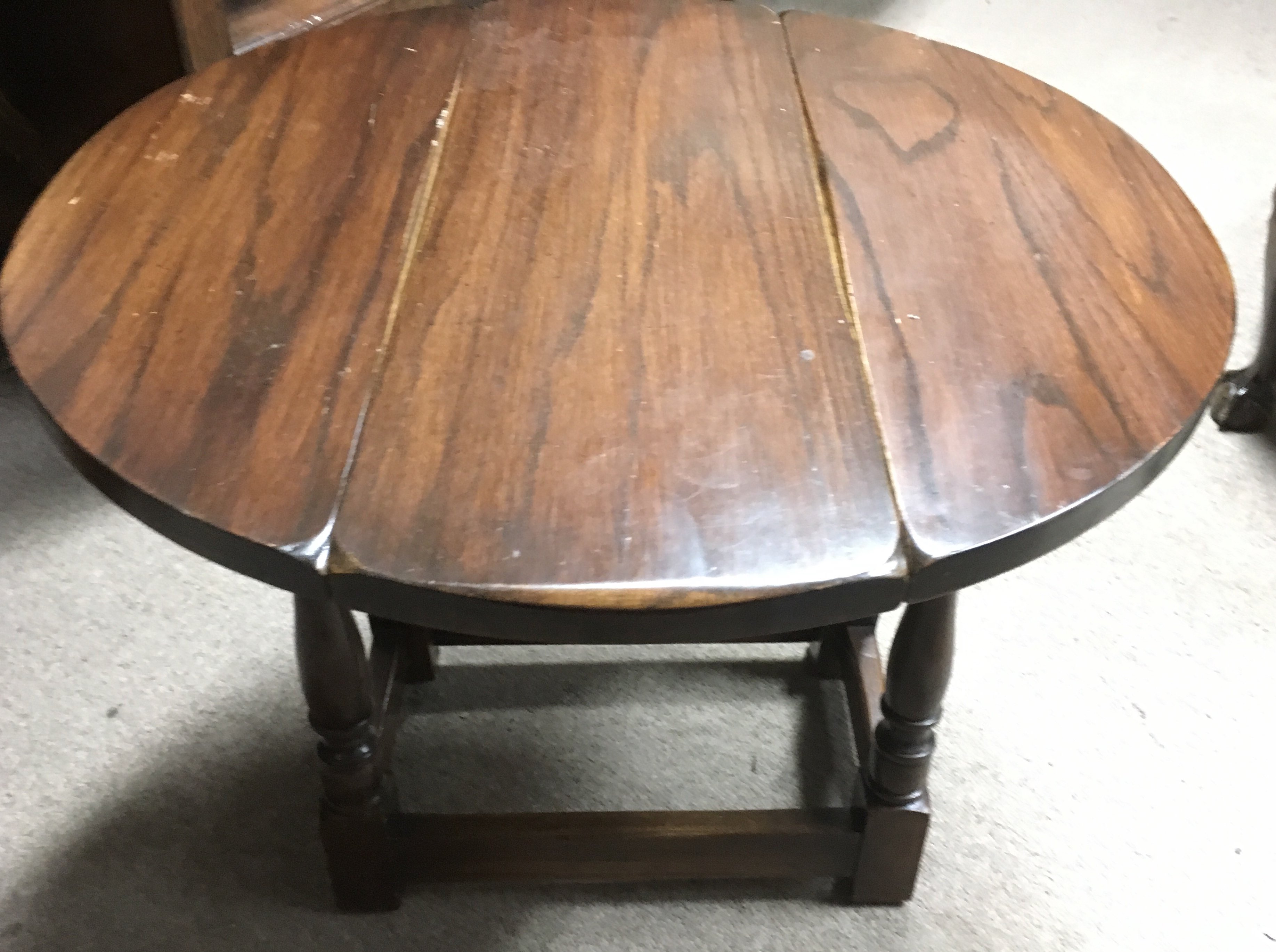 A small, twin flap top table.Approx 59x50cm high