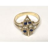 A 14carat gold ring set with Sapphire and diamonds