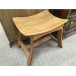 An unusual Japanese style oak stool, approx 36cm x 55cm x 44cm.