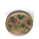 A wooden and painted hide Chinese drum, approx 34c