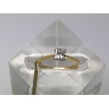 An 18ct gold princess diamond single stone ring, 1