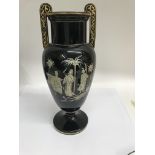 A Victorian acid etched glass vase decorated with