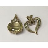 Two 9 ct gold pendants with gem inset