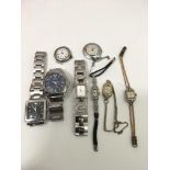 A small group of various watches