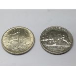 Two American commemorative half dollar coins. The