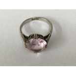 A 18 ct white gold ring inset with pink topazes