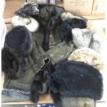 A leather and fur lined coat plus fur hats