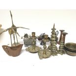 A collection of items comprising a carved hardwood
