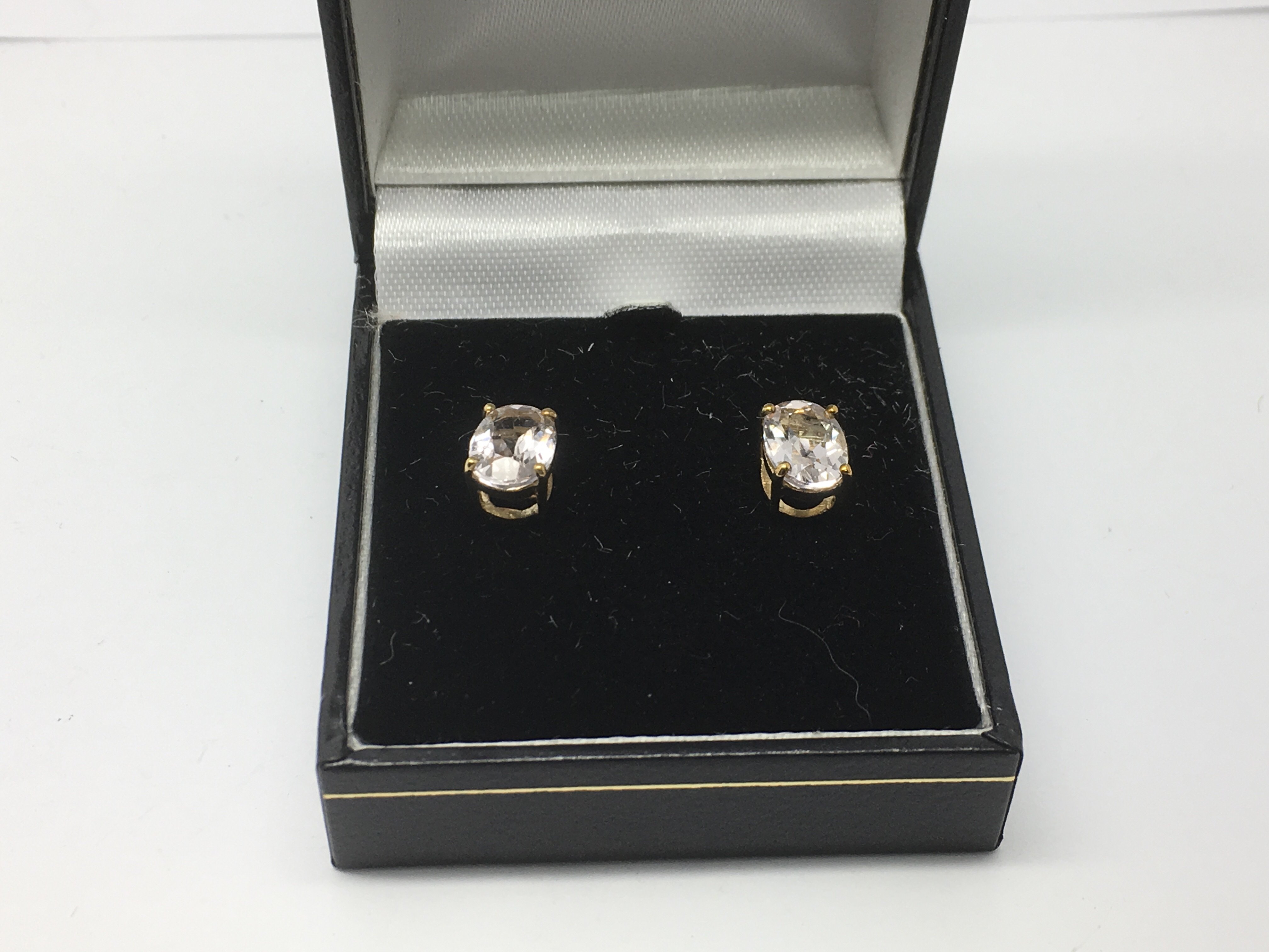 A pair of 9ct gold and Himalayan beryl ear studs,