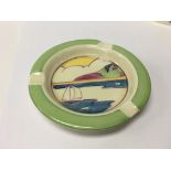 A Clarice Cliff ash tray decorated in the Gibralta