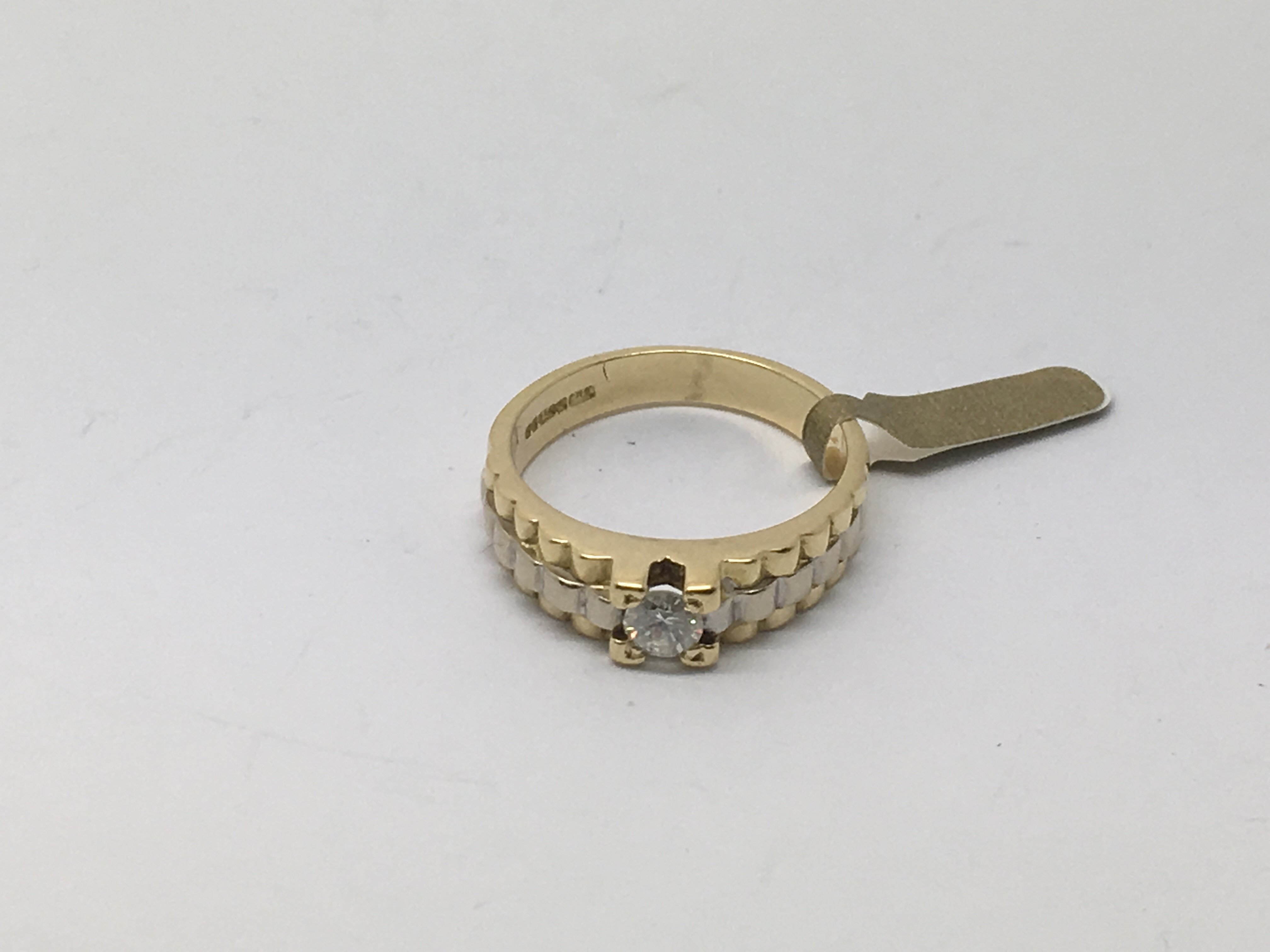 An 18ct yellow and white gold Rolex style diamond
