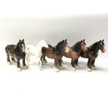A collection of five Beswick ornamental horses of