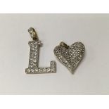 Two 9 ct gold pendants in the form of a heart and