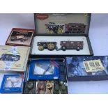 A box of boxed and loose Diecast vehicles includin