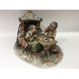 A medium size Capodimonte figural group of a coupl