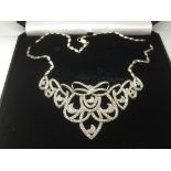 A fine quality silver necklace set with clear ston