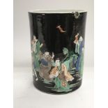 A famille vert brush pot decorated with various fi