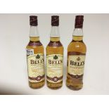 Three bottles of Bells Extra Special aged 8 years