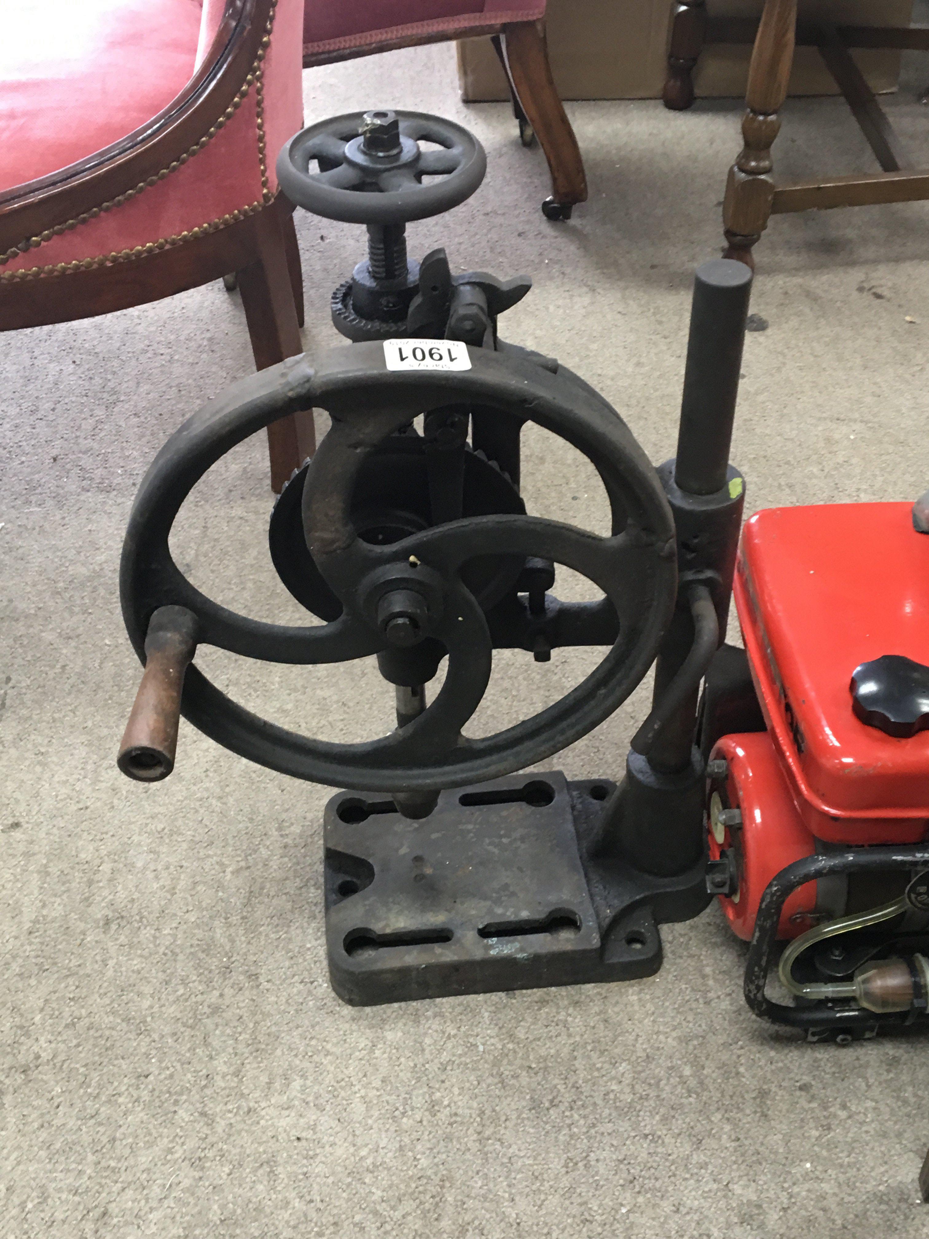 An old manual pillar drill fuel cans and vintage small portable TV (a lot)