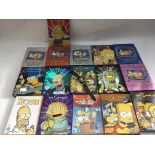 A collection of The Simpsons DVDs