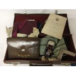 A case containing Masonic regalia. Including a sil