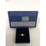 A gold solitaire ring set with .25ct diamond and c
